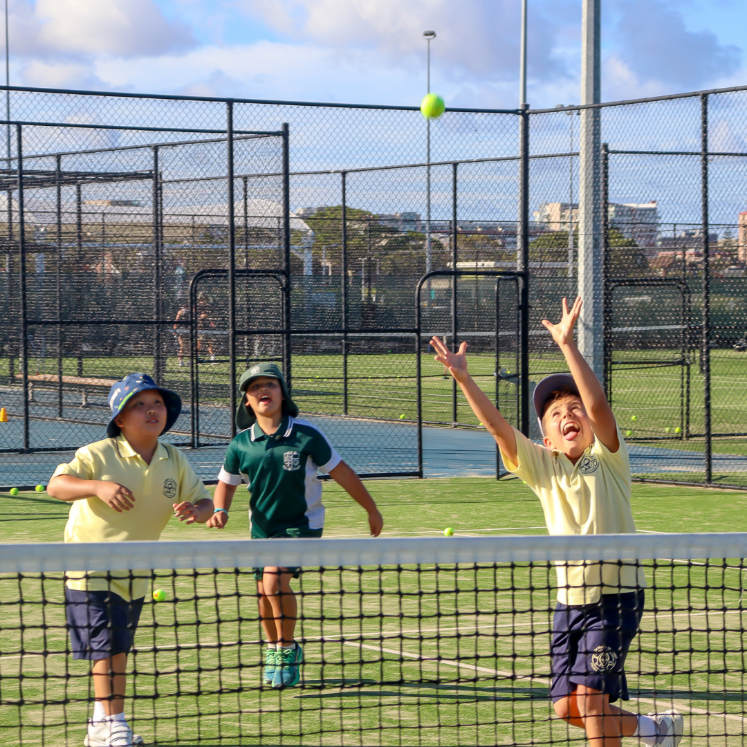 Kids playing tennis